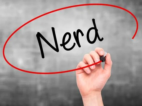 Man Hand writing Nerd with black marker on visual screen Stock Photos