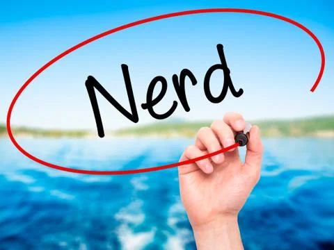 Man Hand writing Nerd with black marker on visual screen Stock Photos