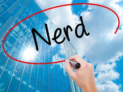 Man Hand writing Nerd with black marker on visual screen Stock Photos