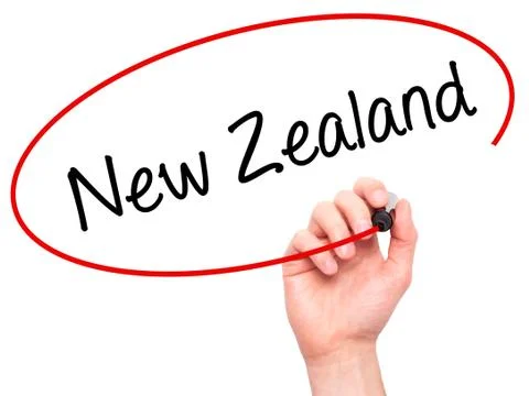 Man Hand writing New Zealand with black marker on visual screen Stock Photos
