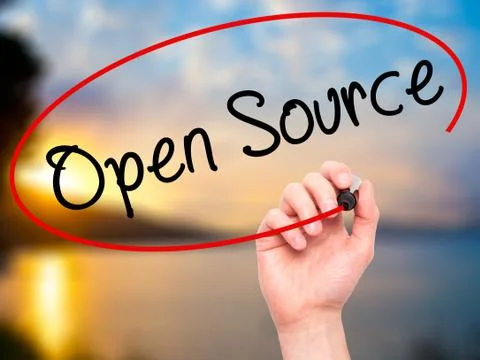 Man Hand writing Open Source with black marker on visual screen Stock Photos