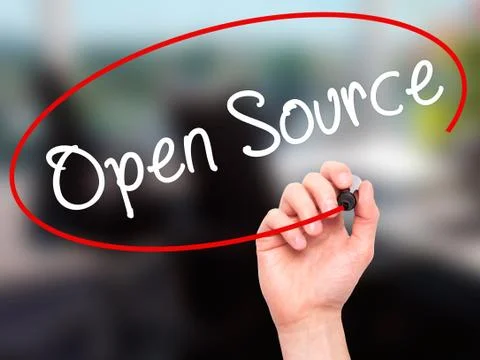 Man Hand writing Open Source with black marker on visual screen Stock Photos