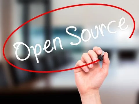 Man Hand writing Open Source with black marker on visual screen Stock Photos