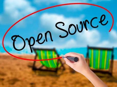 Man Hand writing Open Source with black marker on visual screen Stock Photos