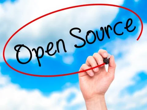 Man Hand writing Open Source with black marker on visual screen Stock Photos