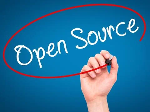 Man Hand writing Open Source with black marker on visual screen Stock Photos
