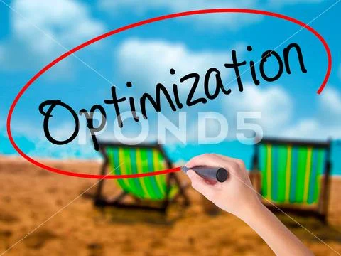 Man Hand writing Optimization with black marker on visual scree Stock Photos