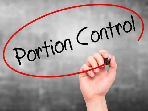Man Hand writing Portion Control with black marker on visual screen Stock Photos