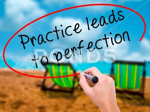 Man Hand writing Practice leads to perfection with black marker Stock Photos