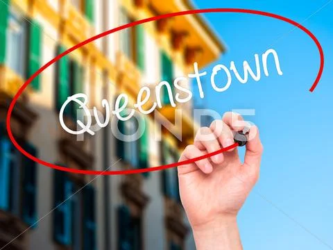 Man Hand writing Queenstown with black marker on visual screen. Stock Illustration