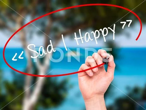 Man Hand writing Sad - Happy with black marker on visual screen. Stock Photos