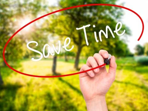 Man Hand writing Save Time with black marker on visual screen Stock Photos