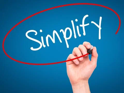 Man Hand writing Simplify with black marker on visual screen Stock Photos