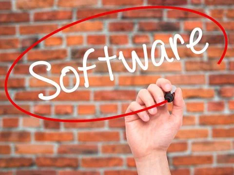 Man Hand writing Software  with black marker on visual screen. Stock Photos