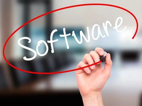 Man Hand writing Software  with black marker on visual screen. Stock Photos