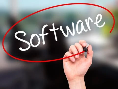 Man Hand writing Software  with black marker on visual screen. Stock Photos