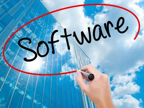 Man Hand writing Software  with black marker on visual screen. Stock Photos