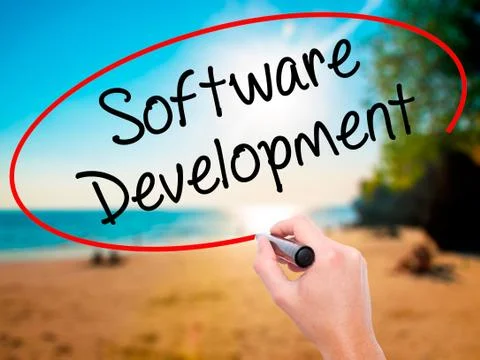 Man Hand writing Software Development with black marker on visua Foto stock