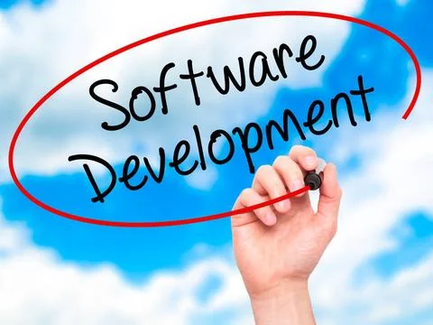 Man Hand writing Software Development with black marker on visual screen M... Stock Photos