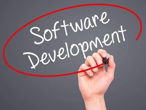 Man Hand writing Software Development with black marker on visual screen M... Stockfoto's