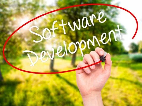 Man Hand writing Software Development with black marker on visual screen M... Foto stock