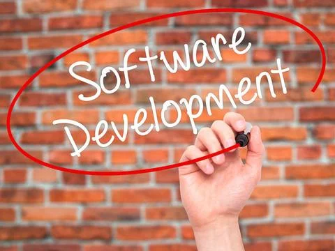 Man Hand writing Software Development with black marker on visual screen M... Stockfoto's