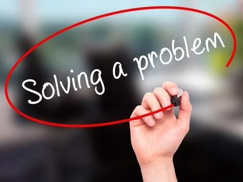 Man Hand writing Solving a problem with black marker on visual screen Stock-Fotos