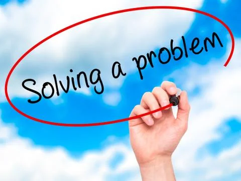 Man Hand writing Solving a problem with black marker on visual screen Foto stock