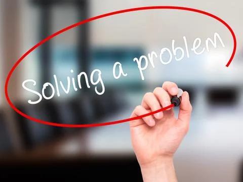 Man Hand writing Solving a problem with black marker on visual screen Foto stock