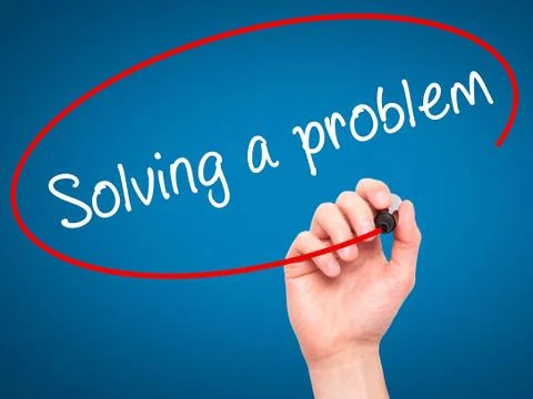 Man Hand writing Solving a problem with black marker on visual screen Foto stock