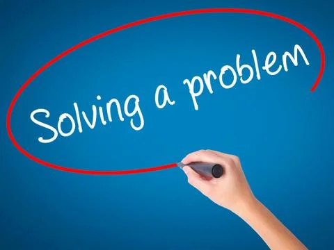 Man Hand writing Solving a problem with black marker on visual screen Foto stock