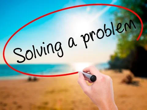 Man Hand writing Solving a problem with black marker on visual s Foto stock