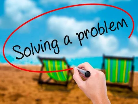 Man Hand writing Solving a problem with black marker on visual s Foto stock