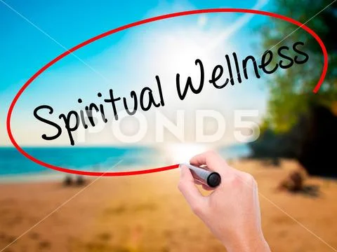 Man Hand writing Spiritual Wellness with black marker on visual Stock Photos