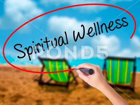 Man Hand writing Spiritual Wellness with black marker on visual Stock Photos