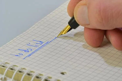 Man hand writing text "to do list" in notebook. Copy space. Concept of duties Fotos de archivo