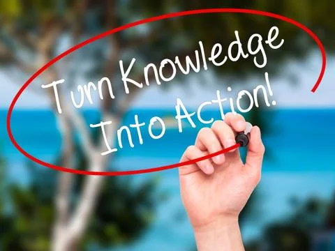 Man Hand writing Turn Knowledge Into Action! with black marker on visual scre Stock Photos