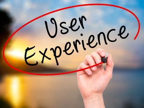 Man Hand writing User Experience with black marker on visual screen Stock Photos