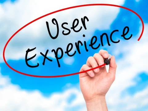 Man Hand writing User Experience with black marker on visual screen Stock Photos
