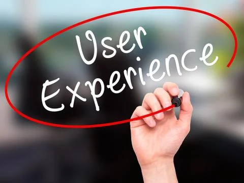 Man Hand writing User Experience with black marker on visual screen Stock Photos