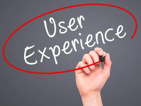 Man Hand writing User Experience with black marker on visual screen Stock Photos