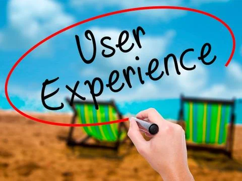 Man Hand writing User Experience with black marker on visual scr Stock Photos
