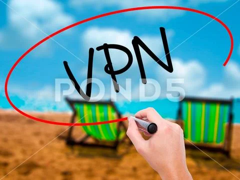 Man Hand writing VPN (Virtual Private Network) with black marker Stock Photos
