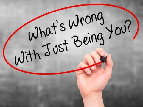 Man Hand writing What's Wrong With Just Being You? with marker on visual screen. Stock Illustration