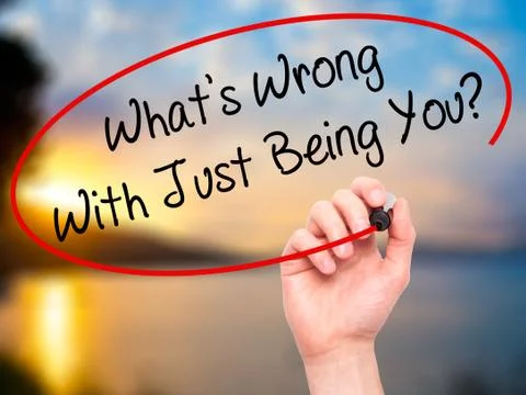 Man Hand writing What's Wrong With Just Being You? with marker on visual screen. Stock Illustration
