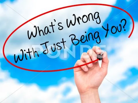 Man Hand writing What's Wrong With Just Being You? with marker on visual screen. Stock Illustration