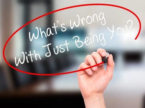 Man Hand writing What's Wrong With Just Being You? with marker on visual screen. Stock Illustration
