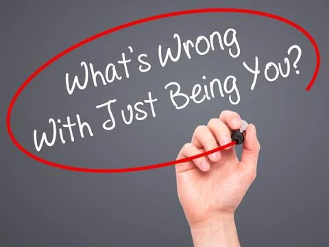 Man Hand writing What's Wrong With Just Being You? with marker on visual screen. Stock Illustration
