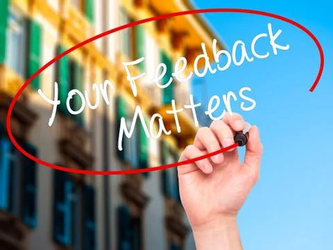 Man Hand writing Your Feedback Matters with black marker on visual screen Stock Photos