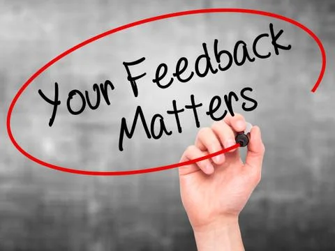 Man Hand writing Your Feedback Matters with black marker on visual screen Stock Photos